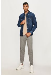 Calvin Klein Jeans - Spodnie. Kolor: szary. Materiał: bawełna, poliester, dzianina. Wzór: aplikacja #3