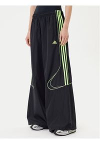 Adidas - adidas Spodnie dresowe Teamgeist adicolor JV7478 Czarny Oversize. Kolor: czarny. Materiał: syntetyk #1