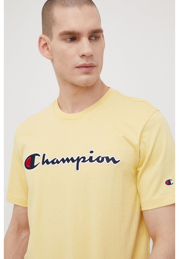 Champion t-shirt bawełniany kolor żółty z aplikacją. Kolor: żółty. Materiał: bawełna. Wzór: aplikacja