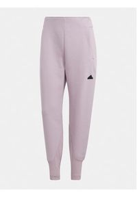 Adidas - adidas Spodnie dresowe Z.N.E. IS3913 Fioletowy Regular Fit. Kolor: fioletowy. Materiał: bawełna, syntetyk #3