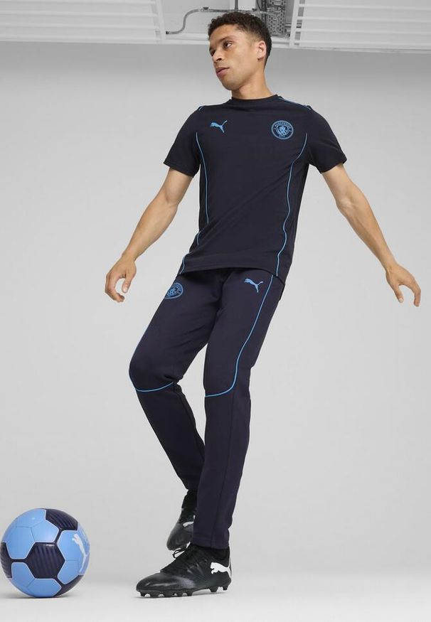 Puma - Męskie spodnie Casuals Manchester City PUMA New Navy Magic Blue. Kolor: niebieski. Materiał: dresówka