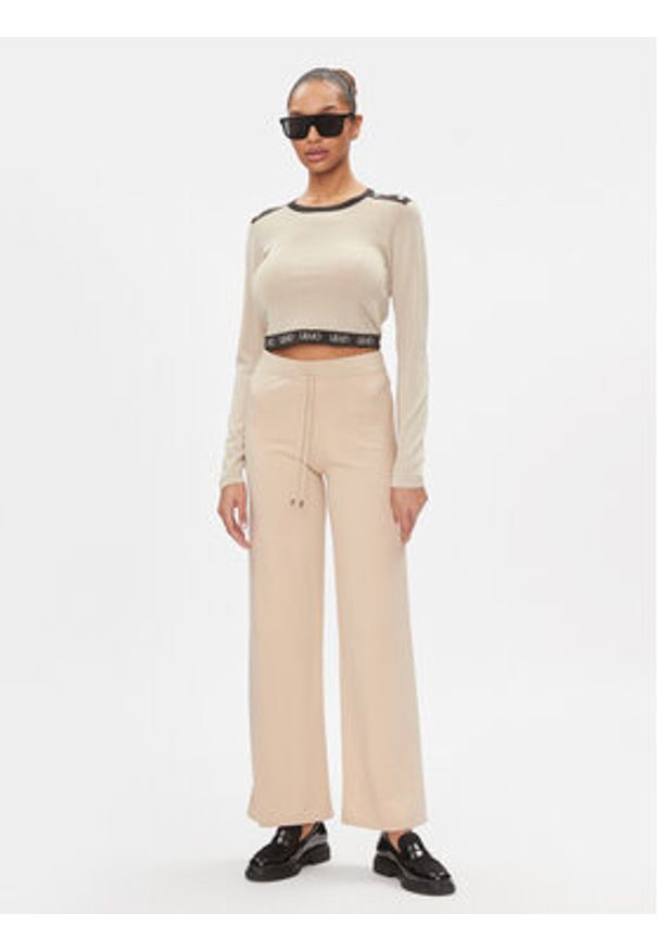 Liu Jo Sport Spodnie dzianinowe TA4052 MS005 Beżowy Bootcut Fit. Kolor: beżowy. Materiał: syntetyk. Styl: sportowy