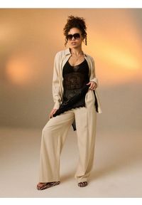 Sinsay - Spodnie wide leg z domieszką lnu - beżowy. Kolor: beżowy