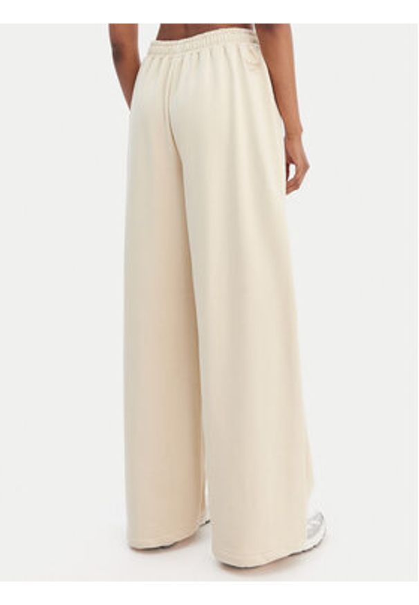 Reebok Spodnie dresowe Reebok x Ewa Chodakowska Hanna RK25624CCW Beżowy Wide Leg. Kolor: beżowy. Materiał: bawełna