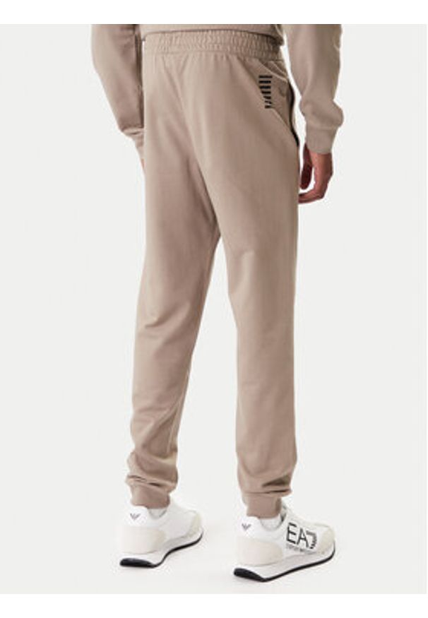 EA7 Emporio Armani Spodnie dresowe 8NPP66 PJVRZ U6167 Beżowy Regular Fit. Kolor: beżowy. Materiał: bawełna