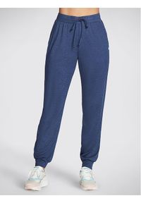 skechers - Skechers Spodnie dresowe Godri Swift Jogger WPT254 Niebieski Regular Fit. Kolor: niebieski. Materiał: syntetyk