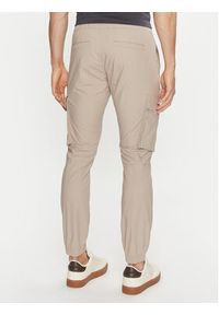 Calvin Klein Jeans Joggery J30J327614 Beżowy Skinny Fit. Kolor: beżowy. Materiał: bawełna