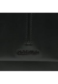 Calvin Klein Saszetka Ck Median Cube Reporter K50K510251 Czarny. Kolor: czarny. Materiał: skóra