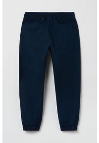 OVS spodnie bawełniane dziecięce kolor granatowy gładkie. Kolor: niebieski. Materiał: bawełna. Wzór: gładki