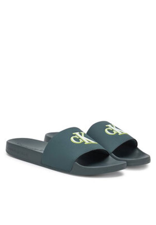 Calvin Klein Jeans Klapki Slide Jelly Mono Pu YM0YM01281 Zielony. Kolor: zielony. Materiał: skóra