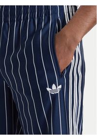 Adidas - adidas Spodnie dresowe Firebird Pinstripes Track Pants KR7231 Granatowy Regular Fit. Kolor: niebieski. Materiał: syntetyk #2