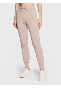Guess Spodnie dresowe Allie Scuba V2YB18 K7UW2 Beżowy Regular Fit. Kolor: beżowy. Materiał: syntetyk
