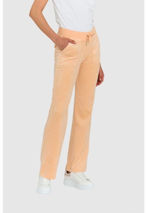 Juicy Couture - JUICY COUTURE Klasyczne welurowe spodnie dresowe damskie del ray w brzoskwiniowym kolorze, Rozmiar XS. Kolor: pomarańczowy. Materiał: dresówka, welur