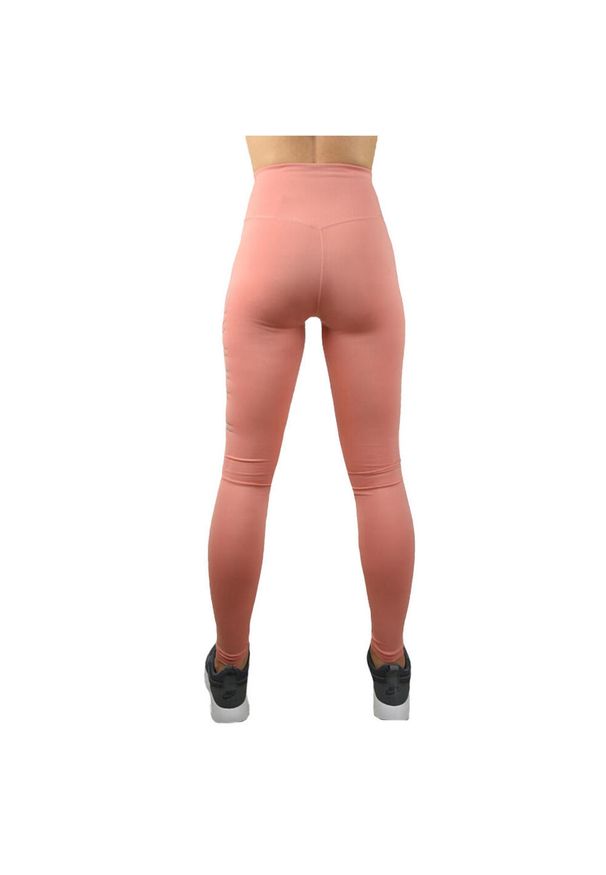 Nike - Spodnie Do Joggingu Damskie Swoosh. Kolor: różowy. Sport: bieganie