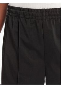 Adidas - adidas Szorty sportowe adicolor Firebird JD0286 Czarny Loose Fit. Kolor: czarny. Materiał: syntetyk #4