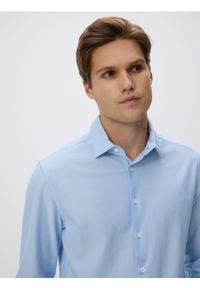 Reserved - Koszula slim fit z bawełną - jasnoniebieski. Kolor: niebieski. Materiał: bawełna #1