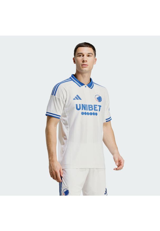 Adidas - Koszulka podstawowa FC Kopenhaga 25/26. Kolor: niebieski, wielokolorowy, biały. Sport: piłka nożna