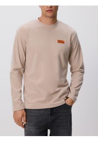 Reserved - Longsleeve regular - beżowy. Kolor: beżowy. Materiał: dzianina. Długość rękawa: długi rękaw. Wzór: gładki
