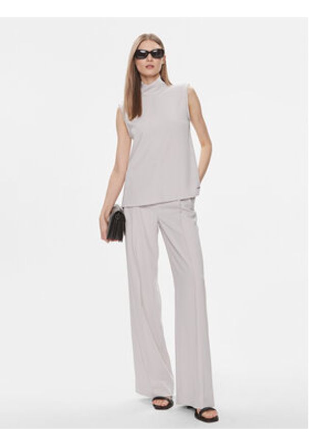 Calvin Klein Spodnie materiałowe K20K206774 Szary Wide Leg. Kolor: szary. Materiał: syntetyk