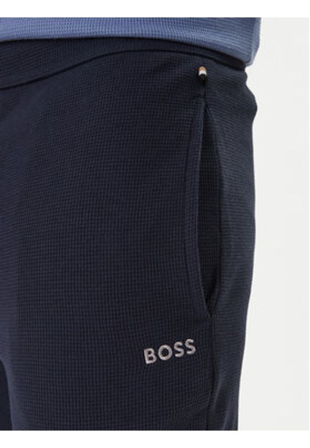 BOSS Spodnie dresowe Waffle 50535878 Granatowy Regular Fit. Kolor: niebieski. Materiał: syntetyk, bawełna