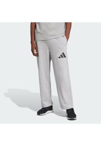 Adidas - Spodnie Essentials Wide Leg 3 Bar Logo. Kolor: czarny, szary, wielokolorowy. Materiał: materiał. Sport: fitness