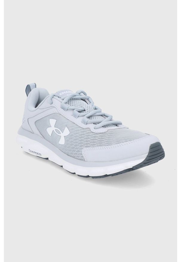Under Armour - Buty UA Charged Assert 9. Nosek buta: okrągły. Zapięcie: sznurówki. Kolor: szary. Materiał: guma. Sport: fitness
