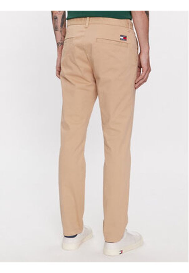 Tommy Jeans Chinosy Austin DM0DM18339 Beżowy Slim Fit. Kolor: beżowy. Materiał: bawełna