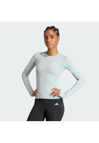 Adidas - Koszulka Power Essentials Workout Contour Long Sleeve. Kolor: zielony. Długość rękawa: długi rękaw. Technologia: ClimaCool (Adidas). Długość: długie. Sport: fitness #1