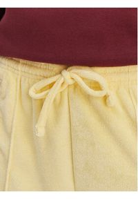 Adidas - adidas Spodnie dresowe Terry Towel Firebird KQ6662 Żółty Loose Fit. Kolor: żółty. Materiał: bawełna #5