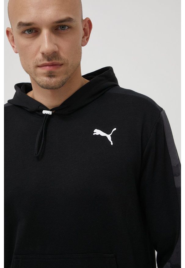 Puma bluza treningowa 521546 męska kolor czarny z kapturem wzorzysta. Typ kołnierza: kaptur. Kolor: czarny. Materiał: skóra, dzianina, materiał. Wzór: gładki, ze splotem