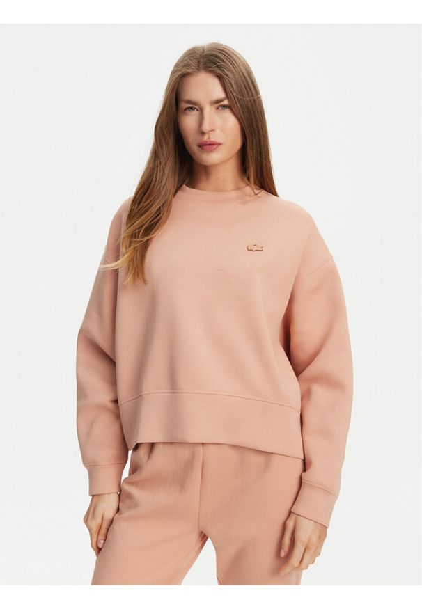 Lacoste Bluza SF5614 Pomarańczowy Oversize. Kolor: pomarańczowy. Materiał: bawełna