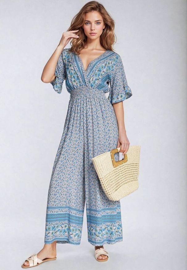 Born2be - Niebieski Bawełniany Kombinezon z Gumkami w Pasie i Kopertowym Dekoltem Zapinany z Tyłu na Guziki Lorrania. Okazja: na co dzień. Kolor: niebieski. Materiał: bawełna. Długość rękawa: krótki rękaw. Długość: krótkie. Styl: wizytowy, casual, elegancki