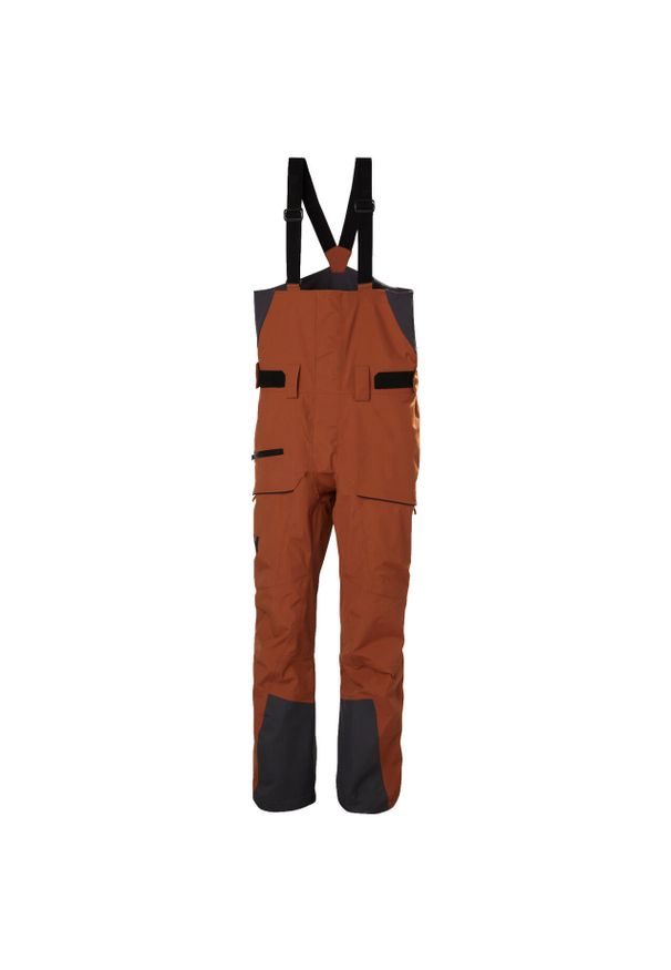 Spodnie narciarskie z szelkami Helly Hansen Sogn Shell. Kolor: pomarańczowy. Sezon: zima. Sport: narciarstwo