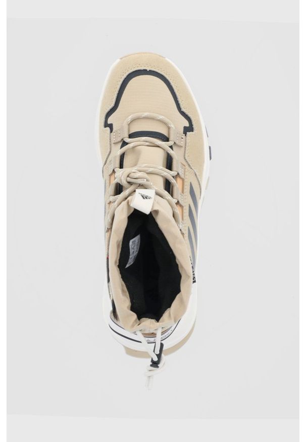 adidas TERREX - adidas Performance Buty damskie kolor beżowy lekko ocieplone. Nosek buta: okrągły. Zapięcie: sznurówki. Kolor: beżowy. Materiał: materiał