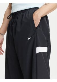 Nike Spodnie dresowe Icon FZ0250 Czarny Regular Fit. Kolor: czarny. Materiał: syntetyk