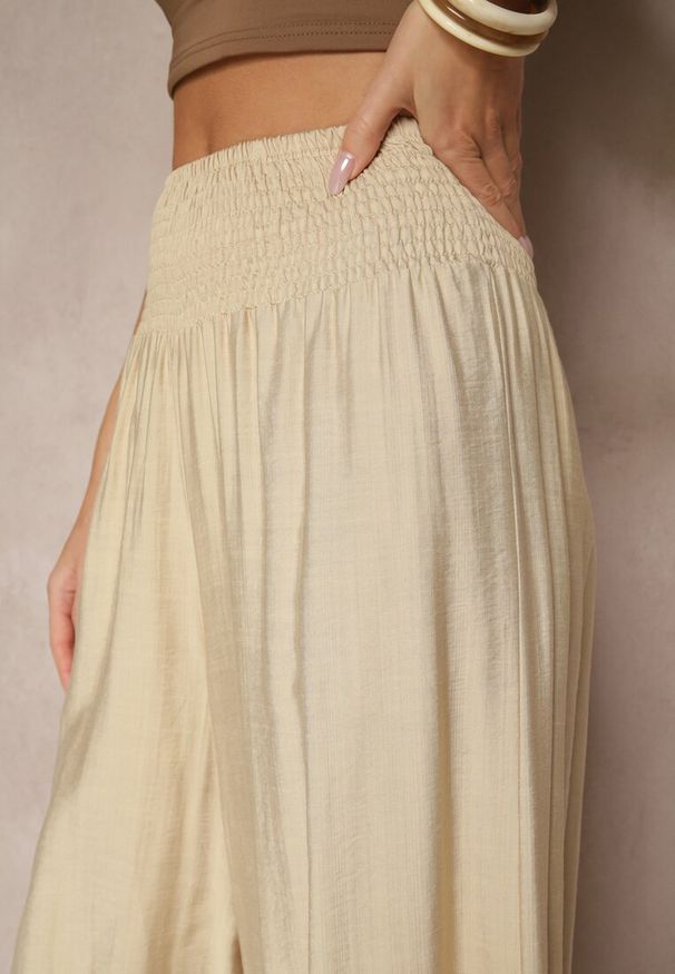 Renee - Beżowe Spodnie z Wiskozą o Szerokim Kroju High Waist Orrana. Okazja: na co dzień. Stan: podwyższony. Kolor: beżowy. Materiał: wiskoza. Styl: casual, elegancki