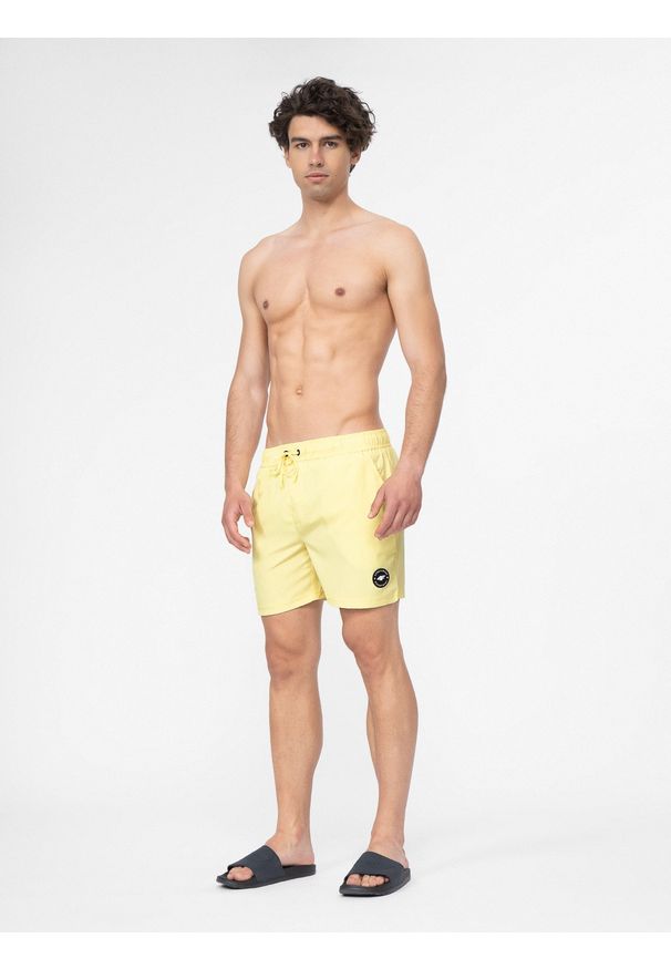 4f - Spodenki kąpielowe boardshorty męskie. Kolor: żółty. Materiał: tkanina, włókno, elastan. Sezon: lato