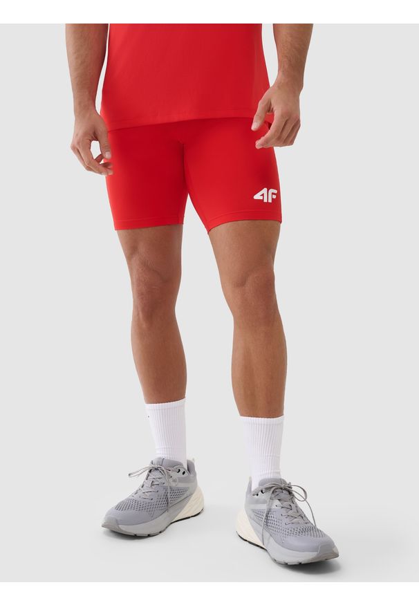 4f - 4F Legginsy krótkie treningowe męskie - czerwone S. Kolor: czerwony. Materiał: dzianina, włókno, syntetyk, materiał, elastan. Wzór: gładki, ze splotem, jednolity. Sport: fitness