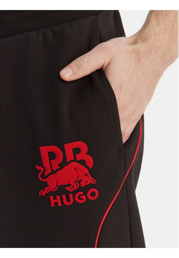 Hugo - HUGO Spodnie dresowe Dusson_RB 50559707 Czarny Relaxed Fit. Kolor: czarny. Materiał: bawełna
