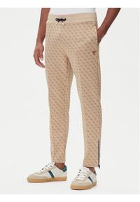 Guess Spodnie dresowe Z2BB05 K7122 Beżowy Regular Fit. Kolor: beżowy. Materiał: bawełna