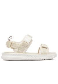 Sandały New Balance SWA600C2 - beżowe. Zapięcie: rzepy. Kolor: beżowy. Materiał: guma, syntetyk, materiał, tworzywo sztuczne. Wzór: paski. Styl: klasyczny #1