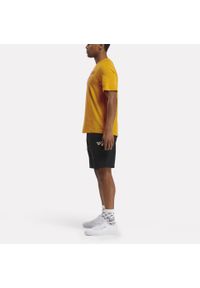 Koszulka fitness męska Reebok krótki rękaw. Kolor: żółty. Materiał: bawełna. Długość rękawa: krótki rękaw. Długość: krótkie. Sport: fitness