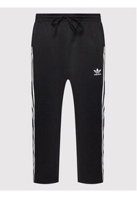 Adidas - adidas Spodnie dresowe adicolor Classics H09121 Czarny Relaxed Fit. Kolor: czarny. Materiał: bawełna