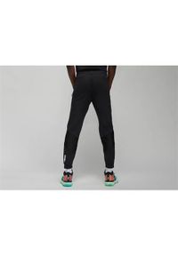 Spodnie sportowe męskie Nike Air Jordan Zion. Kolor: czarny. Materiał: syntetyk, bawełna, materiał. Długość: długie