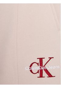 Calvin Klein Jeans Spodnie dresowe Monogram IG0IG02448 Różowy Relaxed Fit. Kolor: różowy. Materiał: bawełna