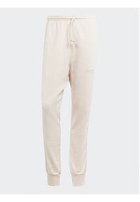 Adidas - adidas Spodnie dresowe ALL SZN 3-Stripes IR5201 Różowy Regular Fit. Kolor: różowy. Materiał: bawełna #2