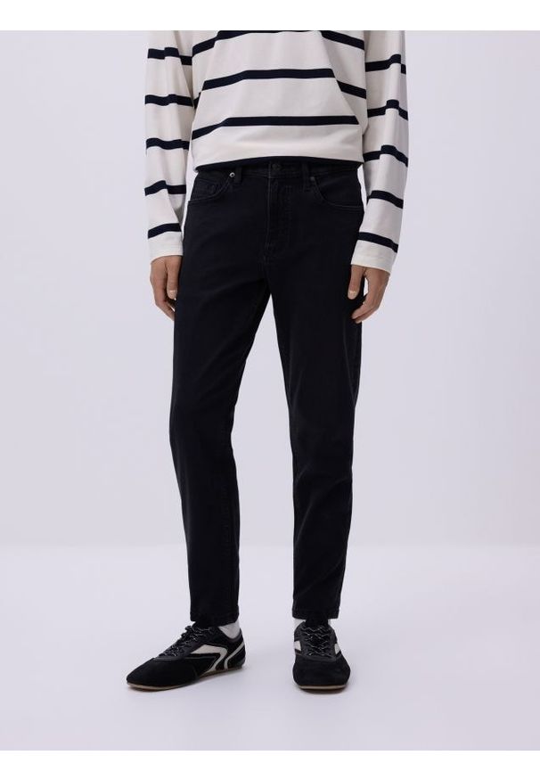 Reserved - Jeansy skinny z efektem sprania - czarny. Kolor: czarny