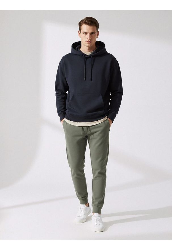 Sinsay - Spodnie dresowe jogger - zielony. Kolor: zielony. Materiał: dresówka