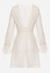 Born2be - Beżowa Rozkloszowana Sukienka Vices z Bufiastymi Rękawami Eriane. Okazja: na co dzień. Kolor: beżowy. Wzór: kropki. Typ sukienki: proste. Styl: casual, elegancki, klasyczny #6