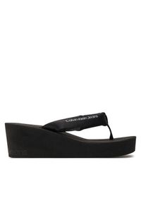 Calvin Klein Jeans Japonki Beach Wedge Sandal Padded Ny YW0YW01397 Czarny. Kolor: czarny. Materiał: materiał